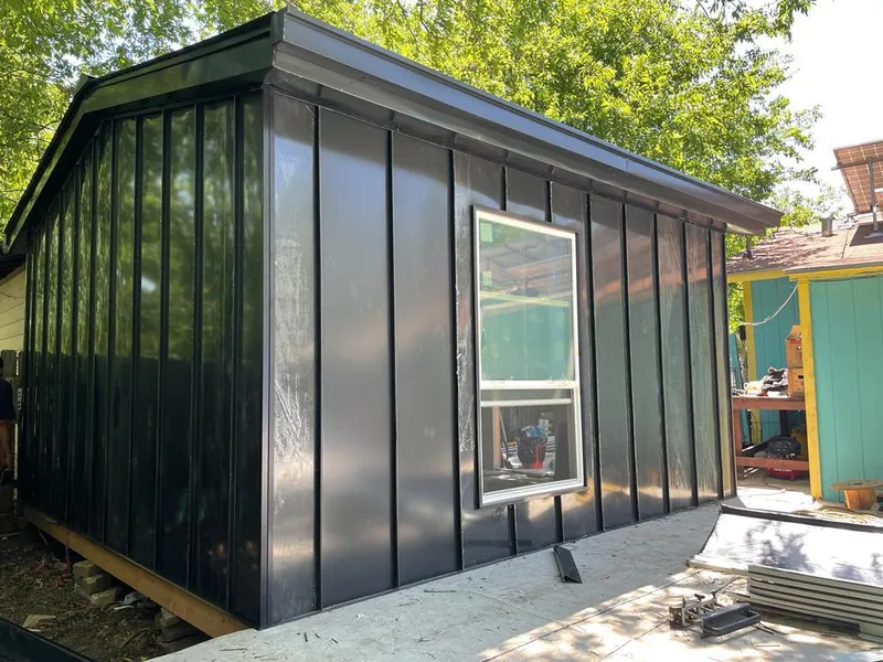 Black standing seam metal wall panels for Roof Inspection in Ville Platte